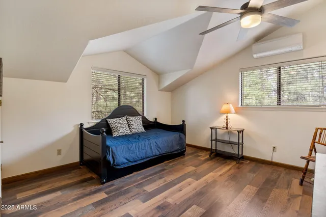 a bathroom with a sink double vanity and a mirror