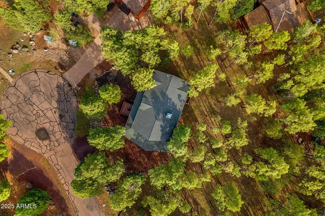 a view of a patio with table and chairs