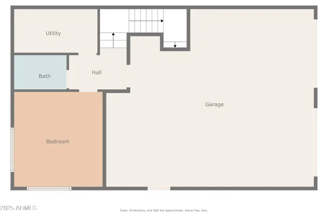 an aerial view of a houses with a yard