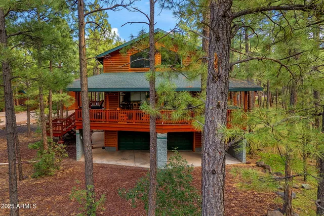 a view of swimming pool with a house