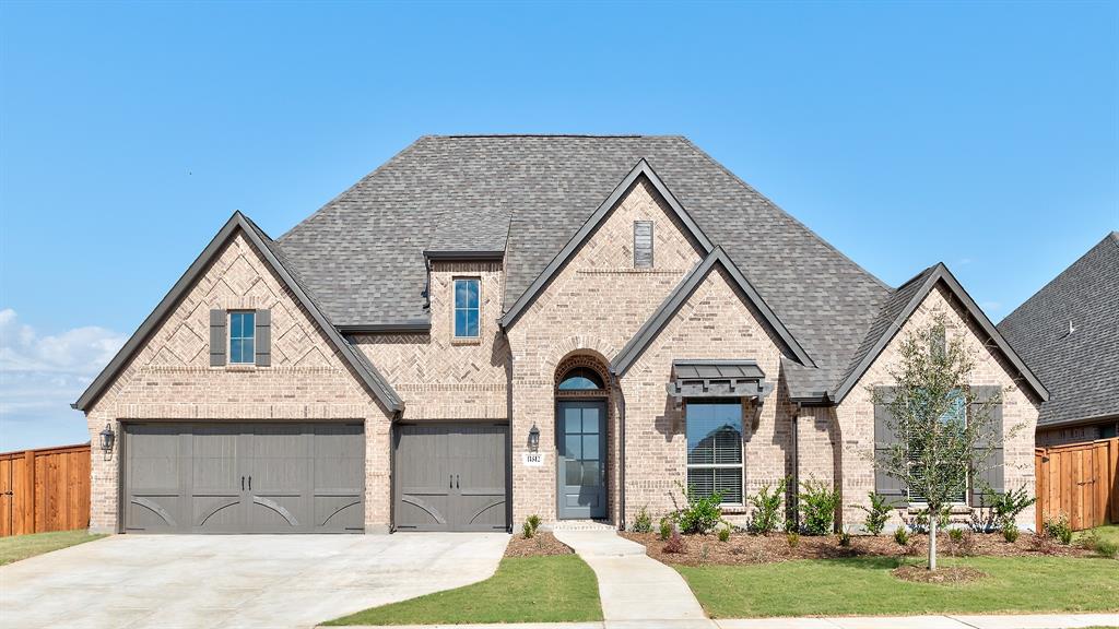 11512 Antler Ridge Way Argyle, TX 76226 - Photo 1 of 1 a view of a house with garden
