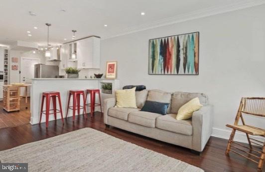 1260 Penn Street Northeast Washington, DC 20002 - Photo 2 of 24 Modern living space with vibrant art.
