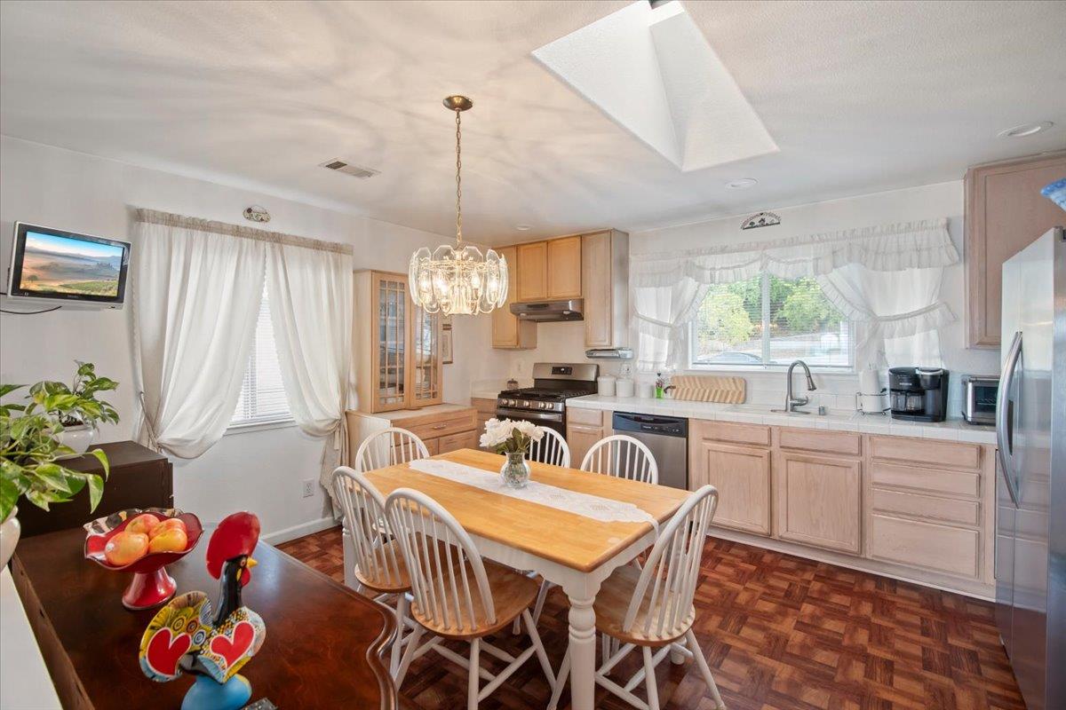 25583 Spring Drive Hayward, CA 94542 - Photo 7 of 27 a very nice looking dining room with a window and furniture