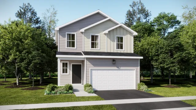a front view of a house with a yard and trees