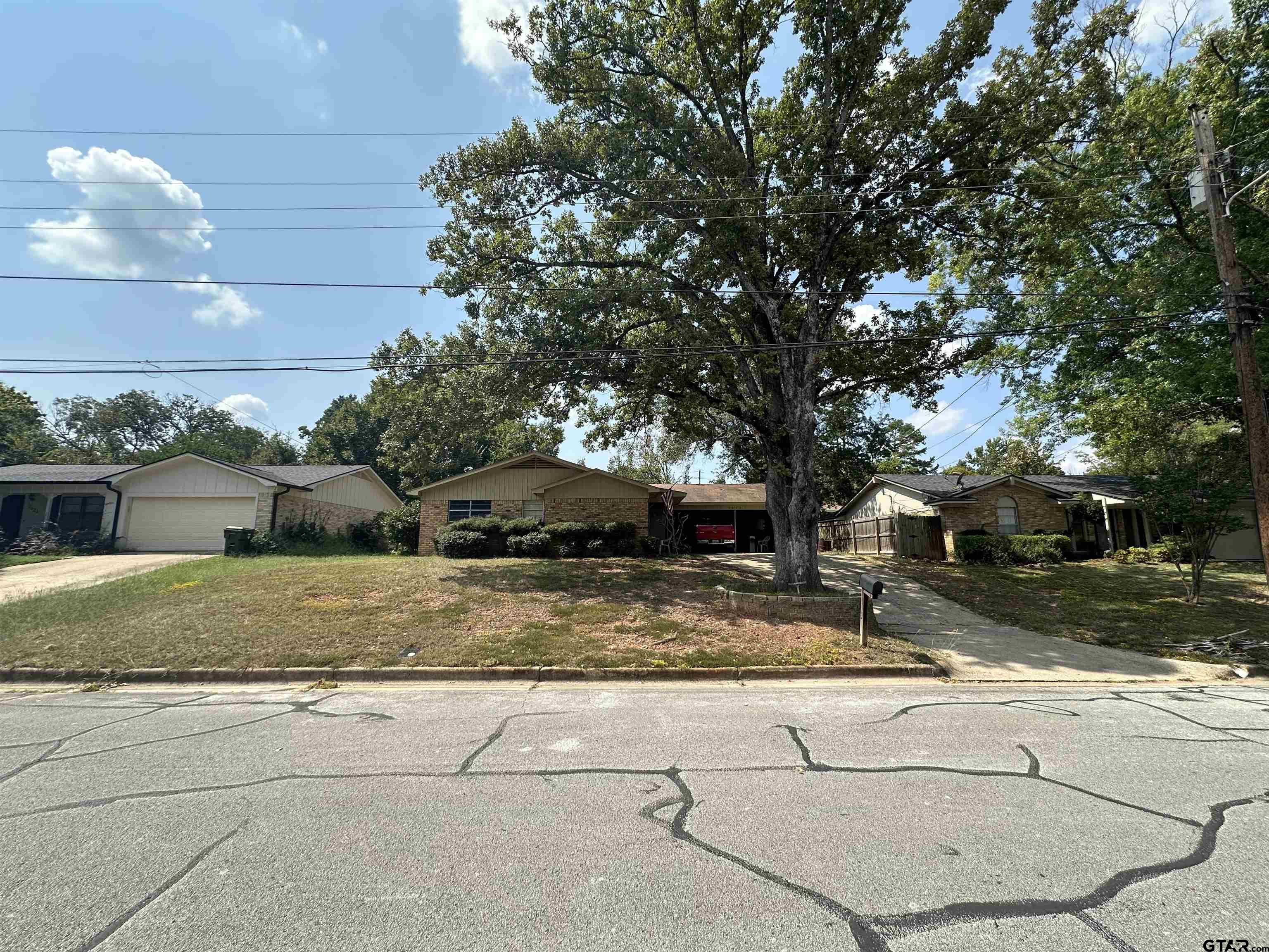 2613 Chelsea Drive Tyler, TX 75701 - Photo 2 of 33 a view of backyard of the house