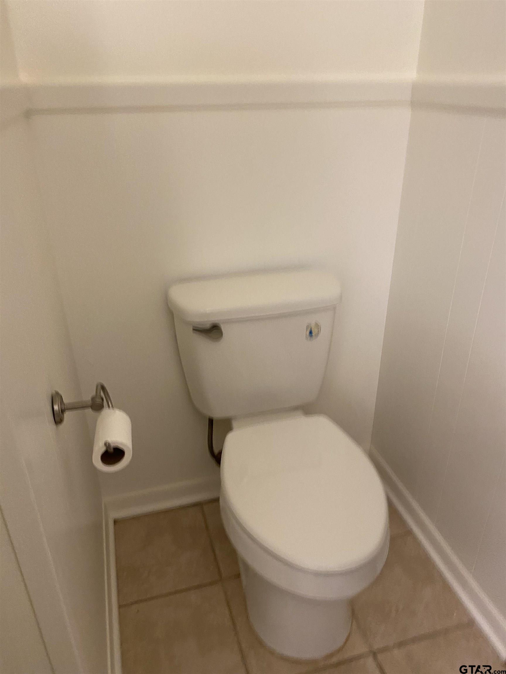 2613 Chelsea Drive Tyler, TX 75701 - Photo 25 of 33 a white toilet sitting next to a shower