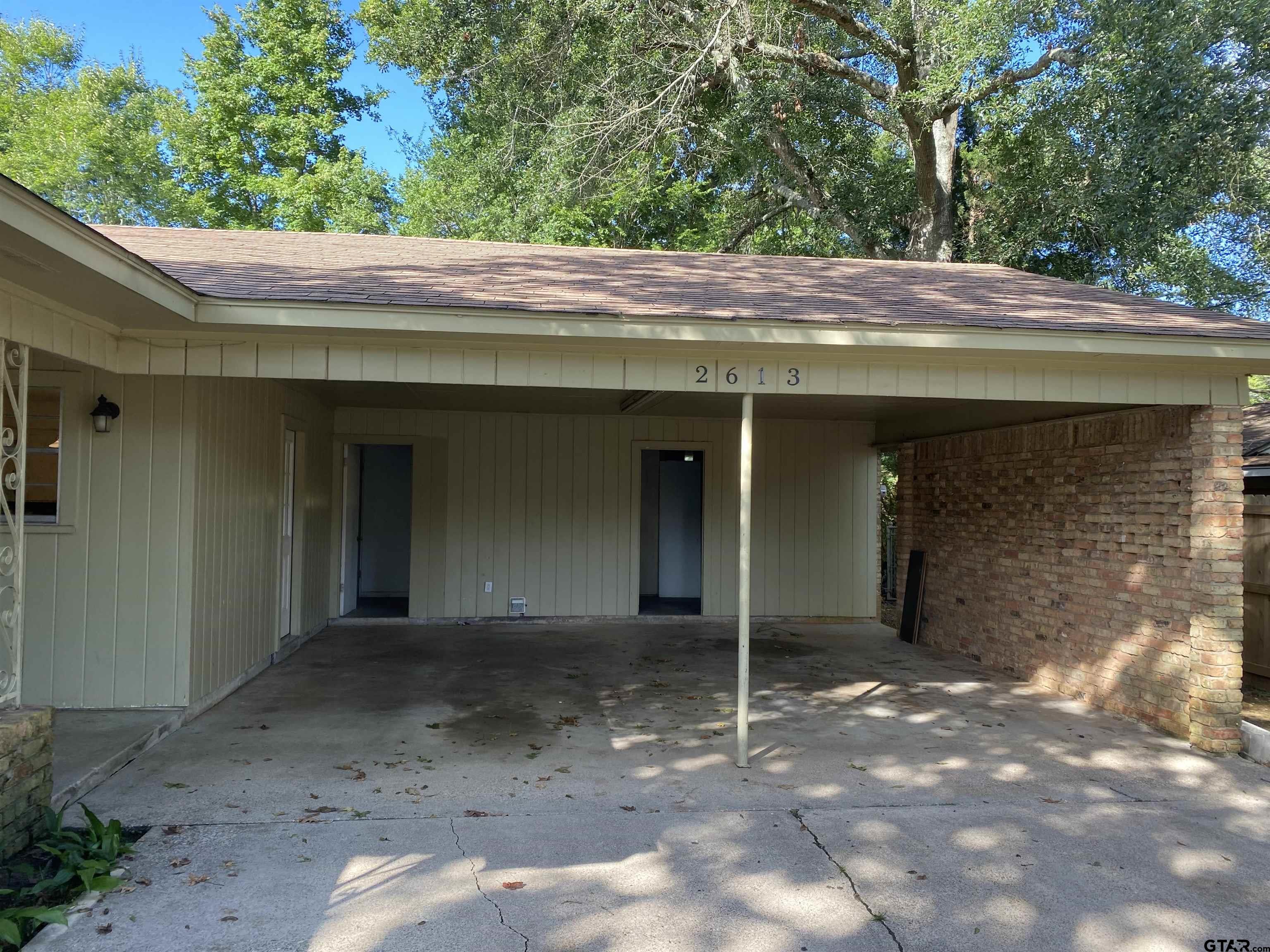 2613 Chelsea Drive Tyler, TX 75701 - Photo 6 of 33 a backyard of a house