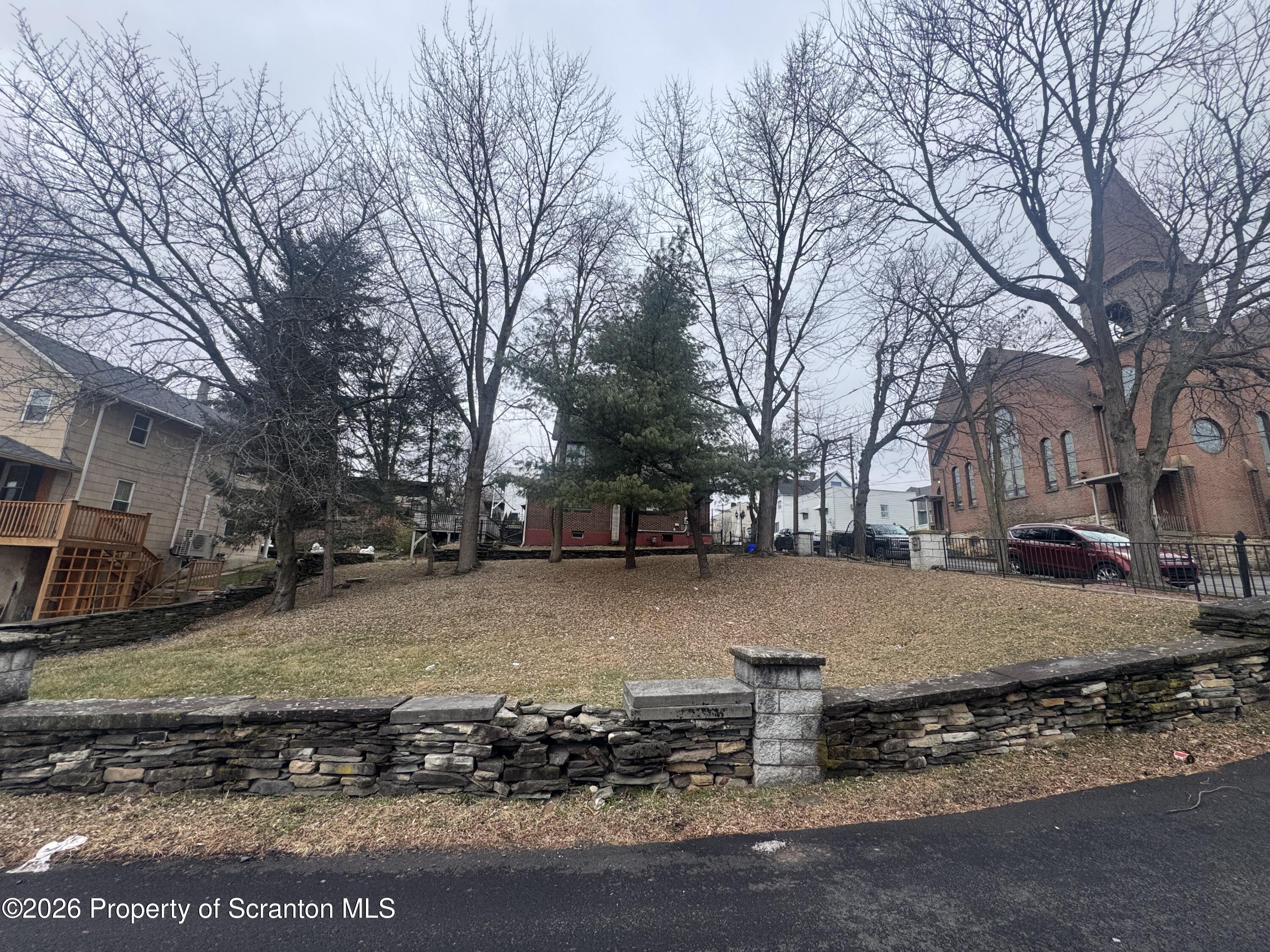 817 Court Street Scranton, PA 18508 - Photo 3 of 3 a street view covered with snow
