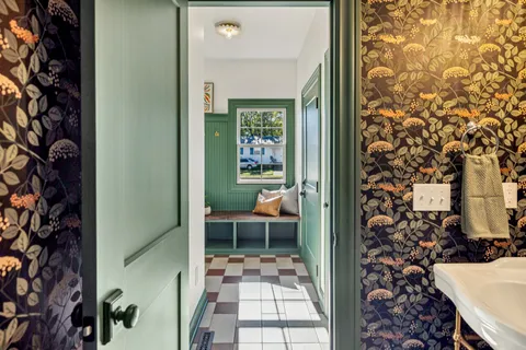 a bedroom with furniture and a window