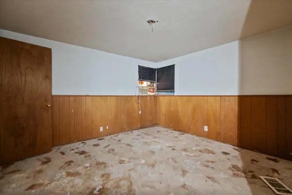 a view of a big room with a wooden closet