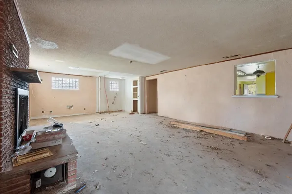 a view of a livingroom with wooden floor