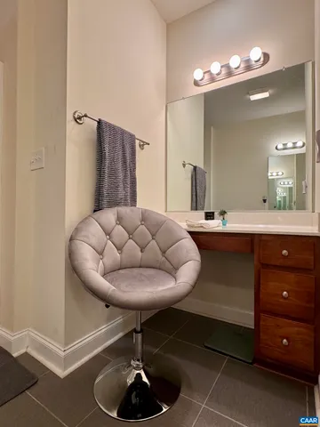 a bathroom with a double vanity sink a mirror and shower