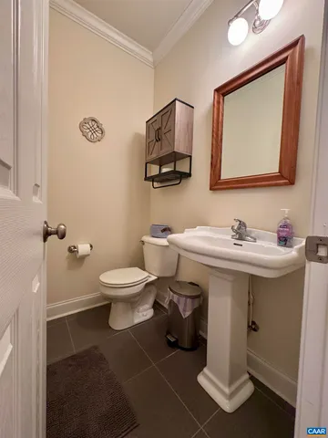 a bed room with a bed and a television