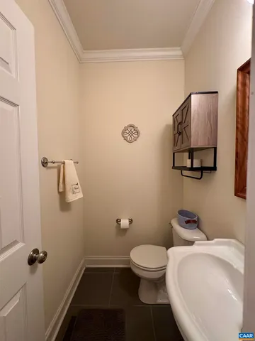 a room with furniture and musical instruments