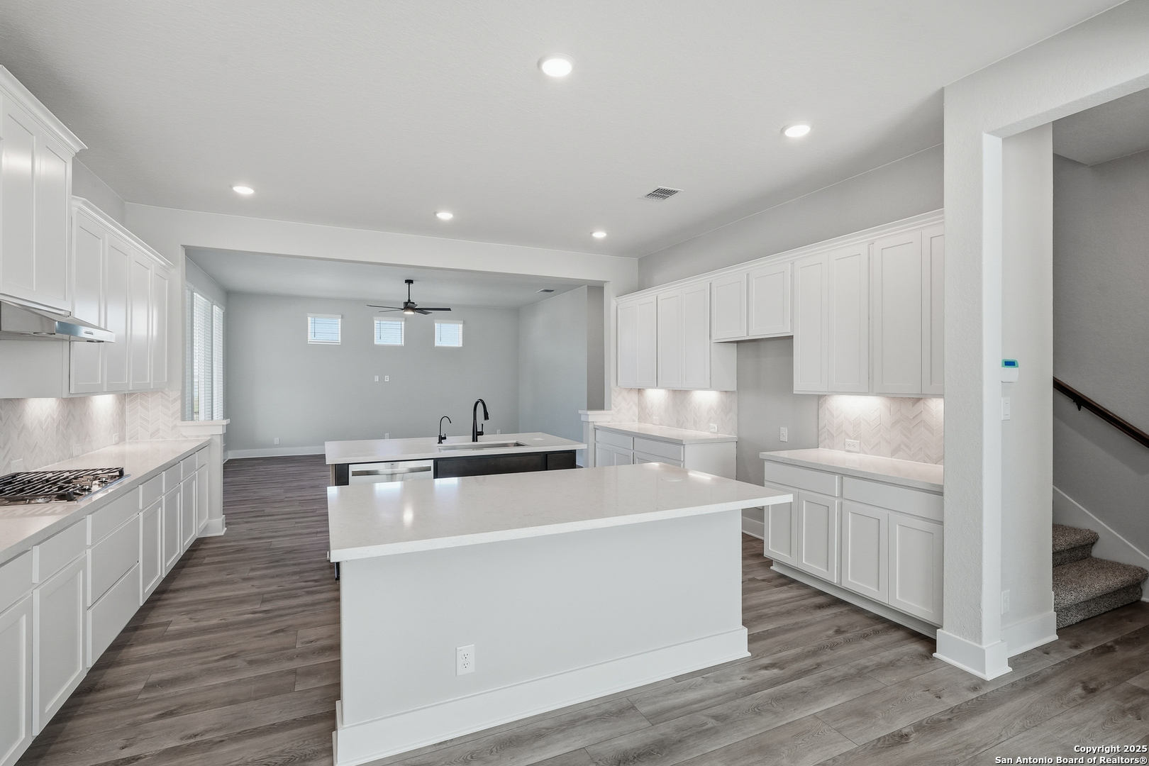 326 Vamanos Boerne, TX 78006 - Photo 16 of 55 a large kitchen with stainless steel appliances a large counter top and a stove