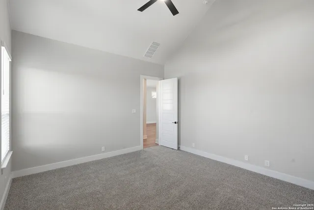 a bathroom with a double vanity sink mirror and shower