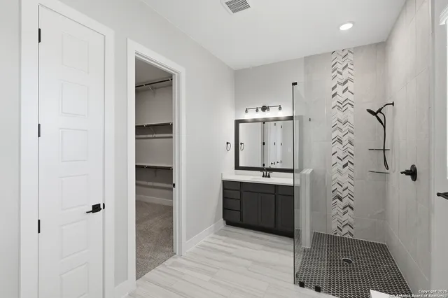 a view of a bathroom from the hallway