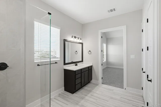 a view of an empty walk in closet