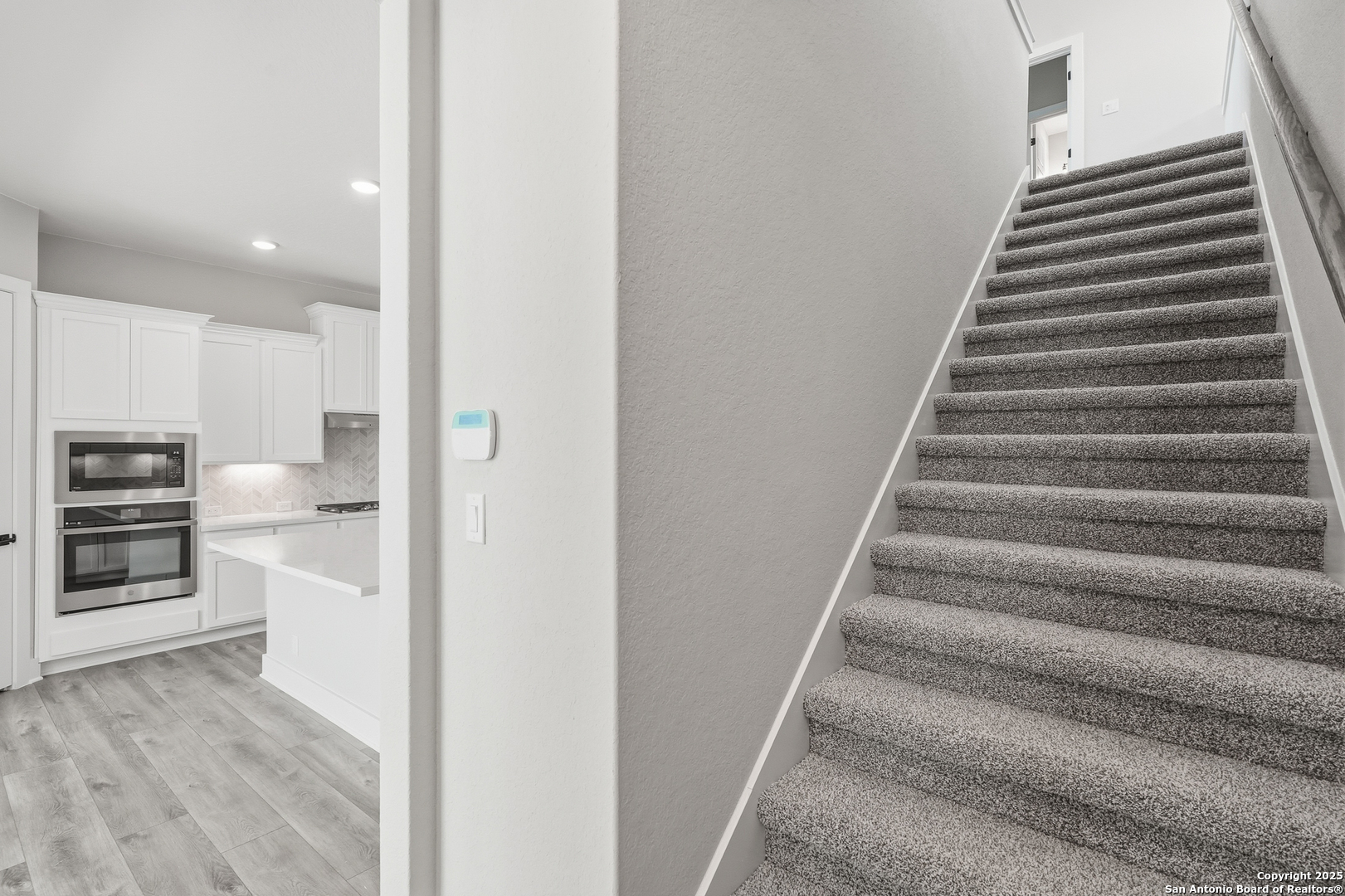 326 Vamanos Boerne, TX 78006 - Photo 30 of 55 a view of a kitchen with wooden floor and electronic appliances