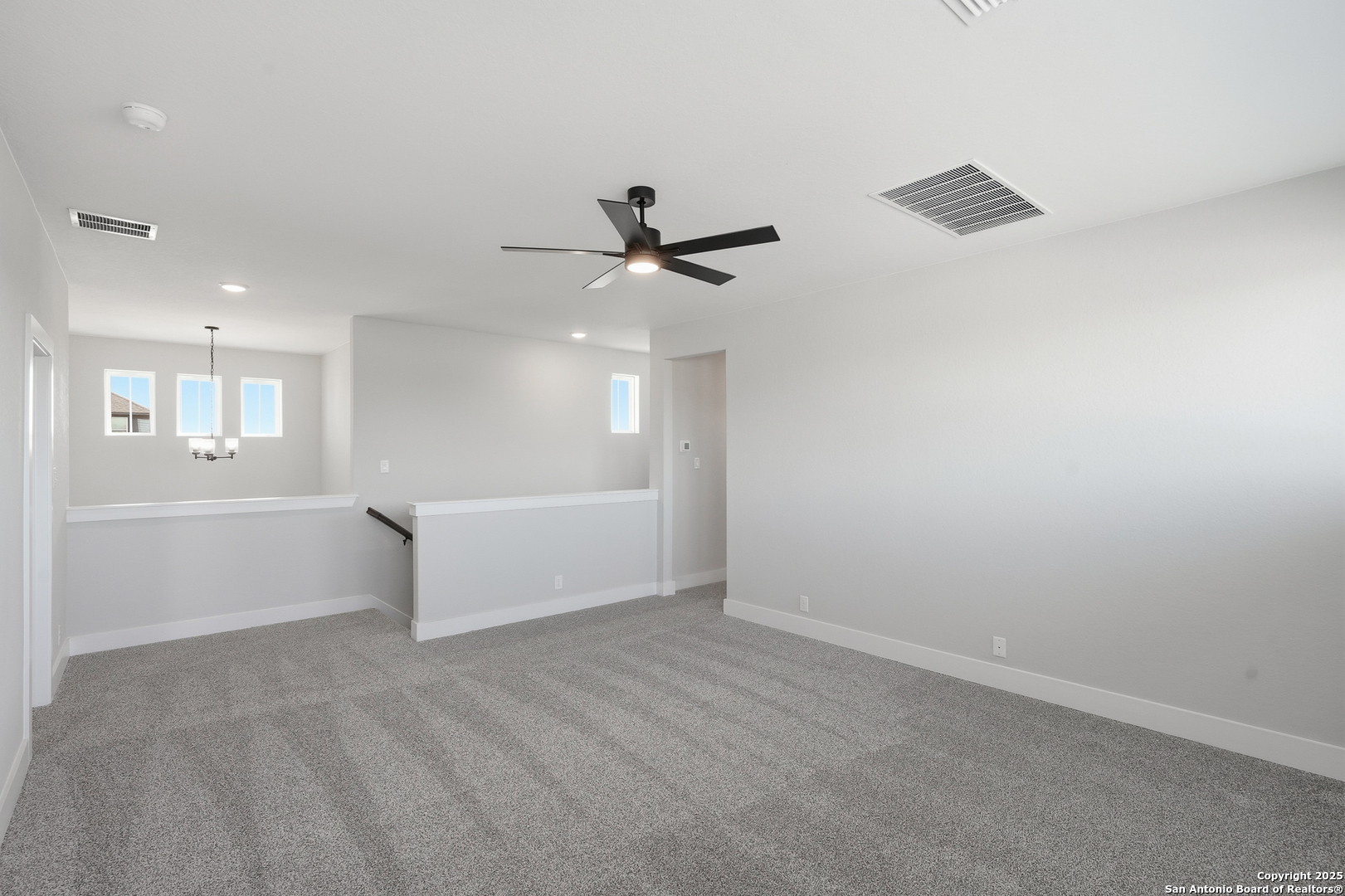 326 Vamanos Boerne, TX 78006 - Photo 31 of 55 an empty room with fan and windows