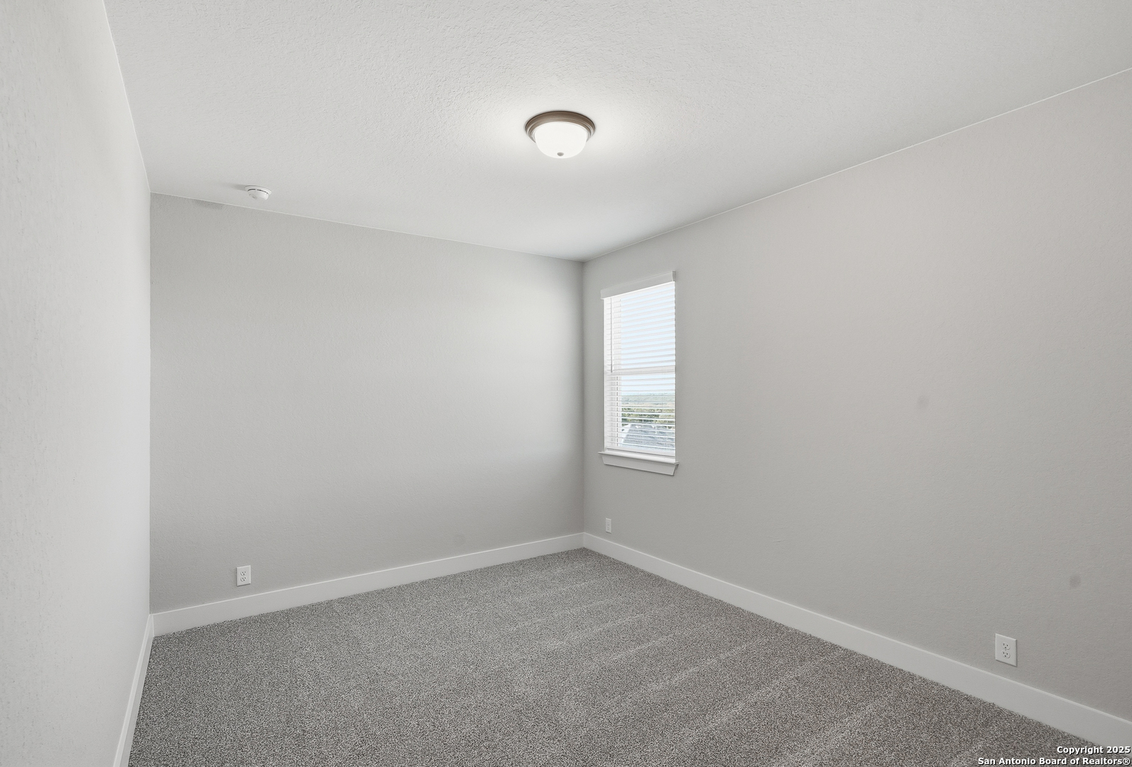 326 Vamanos Boerne, TX 78006 - Photo 39 of 55 an empty room with a window