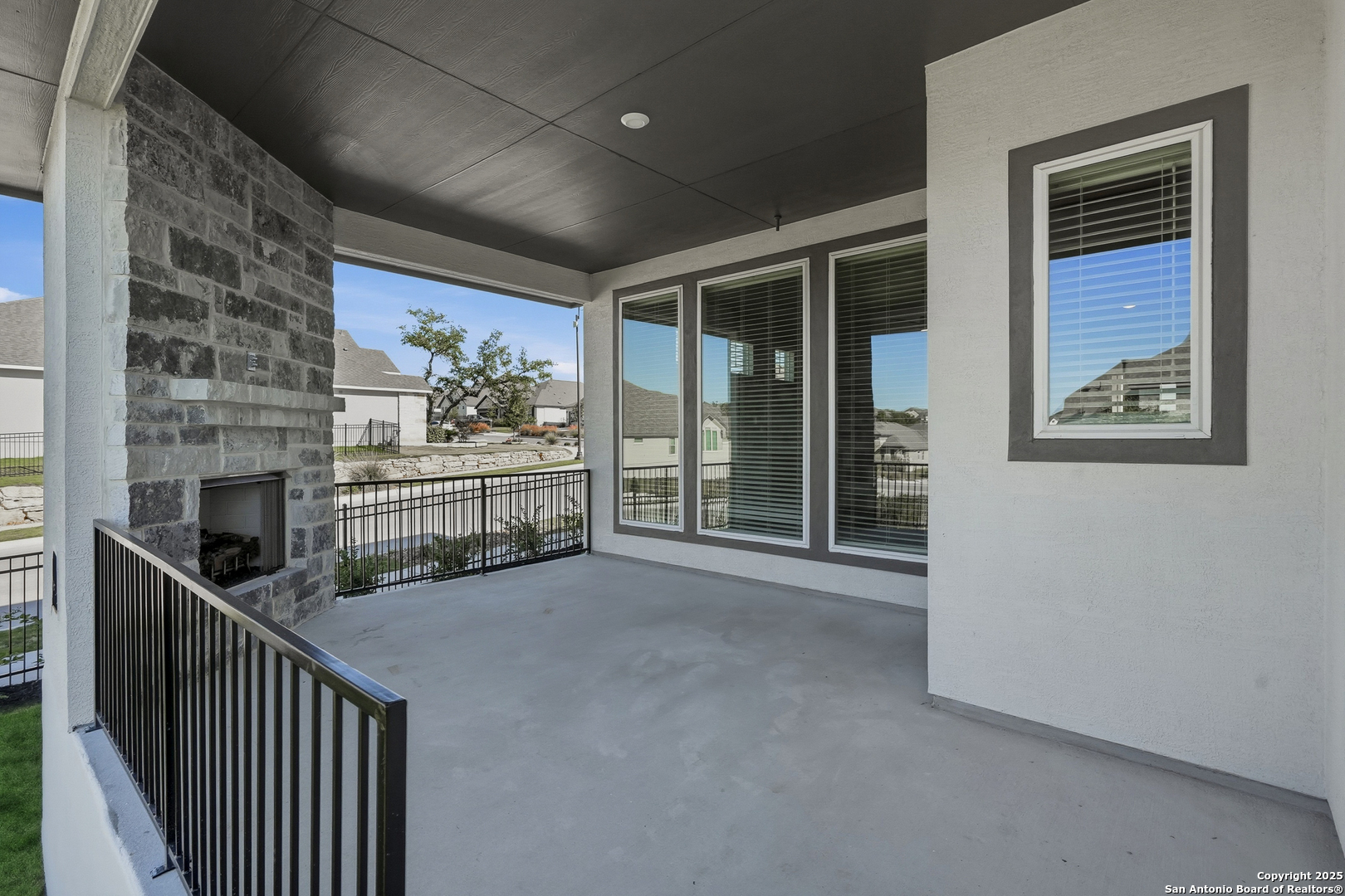 326 Vamanos Boerne, TX 78006 - Photo 44 of 55 a view of a hallway with wooden floor and windows