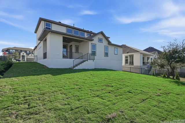 swimming pool view with a lake view