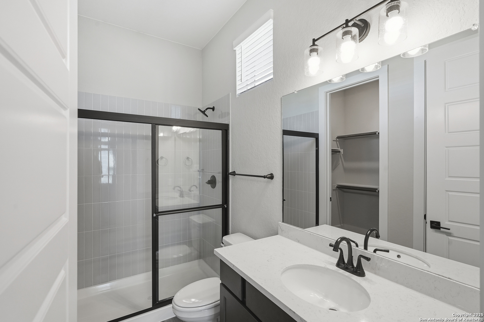 326 Vamanos Boerne, TX 78006 - Photo 9 of 55 a bathroom with a sink toilet and shower