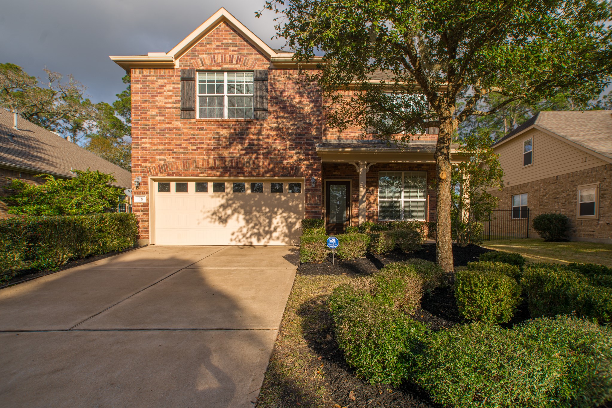 78 East Heritage Mill Circle The Woodlands, TX 77375 - Photo 1 of 50 a front view of a house with garden