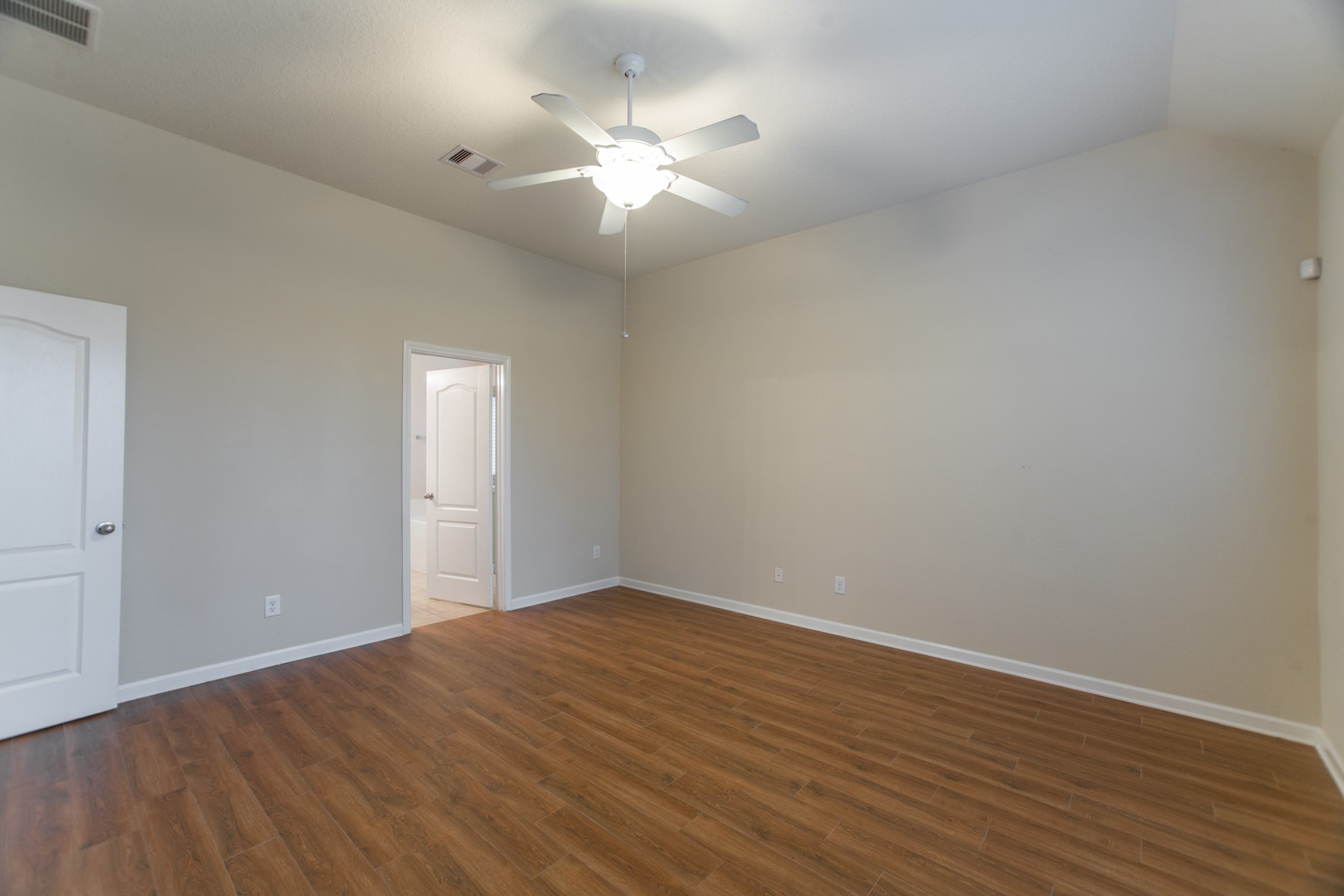 78 East Heritage Mill Circle The Woodlands, TX 77375 - Photo 23 of 50 wooden floor in an empty room
