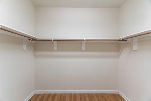 a view of an empty walk in closet