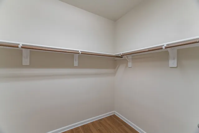 a view of a room with racks on the wall