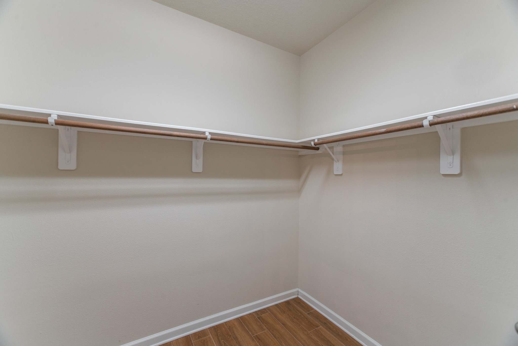 78 East Heritage Mill Circle The Woodlands, TX 77375 - Photo 29 of 50 a view of a room with racks on the wall