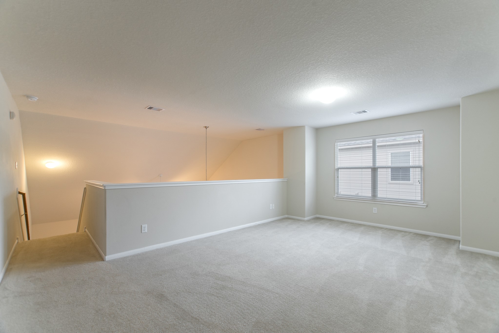 78 East Heritage Mill Circle The Woodlands, TX 77375 - Photo 34 of 50 a view of an empty room with a window