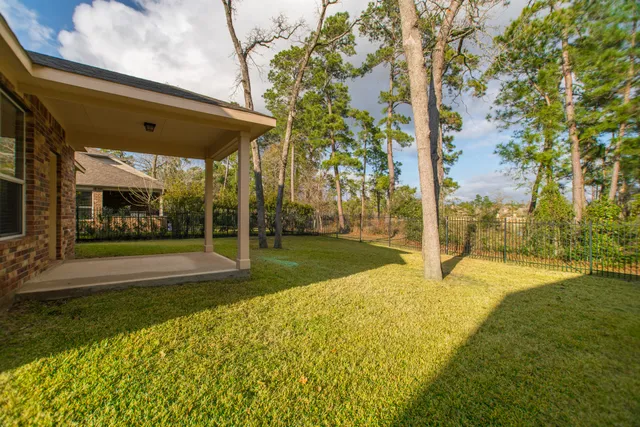 a view of swimming pool with yard