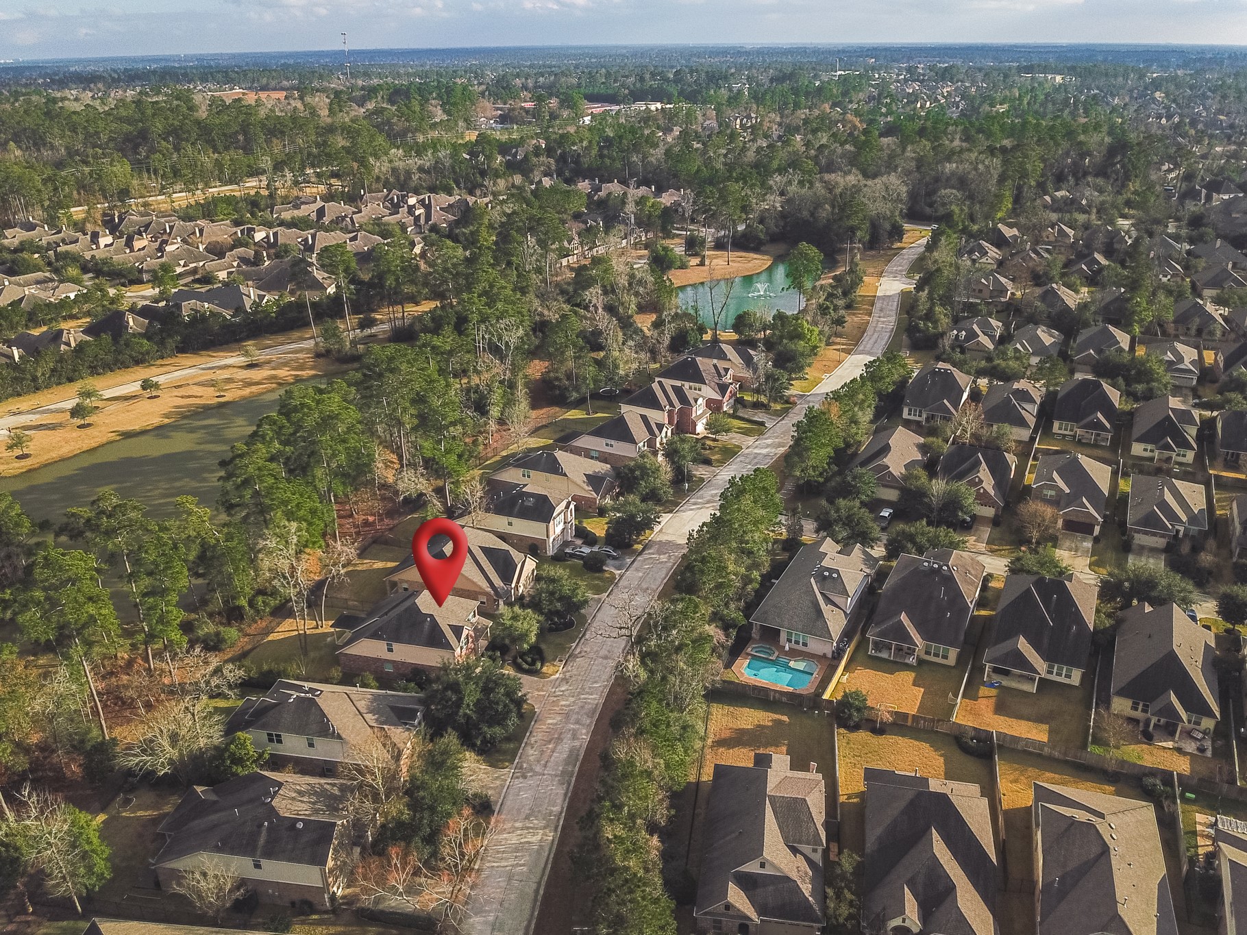 78 East Heritage Mill Circle The Woodlands, TX 77375 - Photo 45 of 50 an aerial view of residential houses with outdoor space