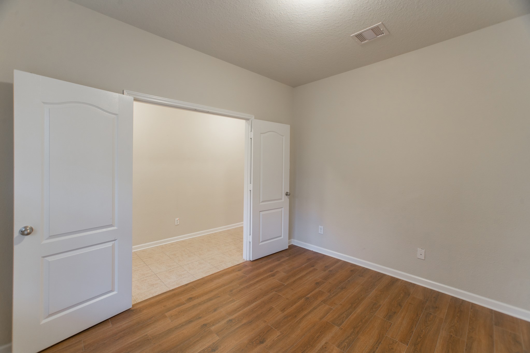 78 East Heritage Mill Circle The Woodlands, TX 77375 - Photo 8 of 50 wooden floor in an empty room