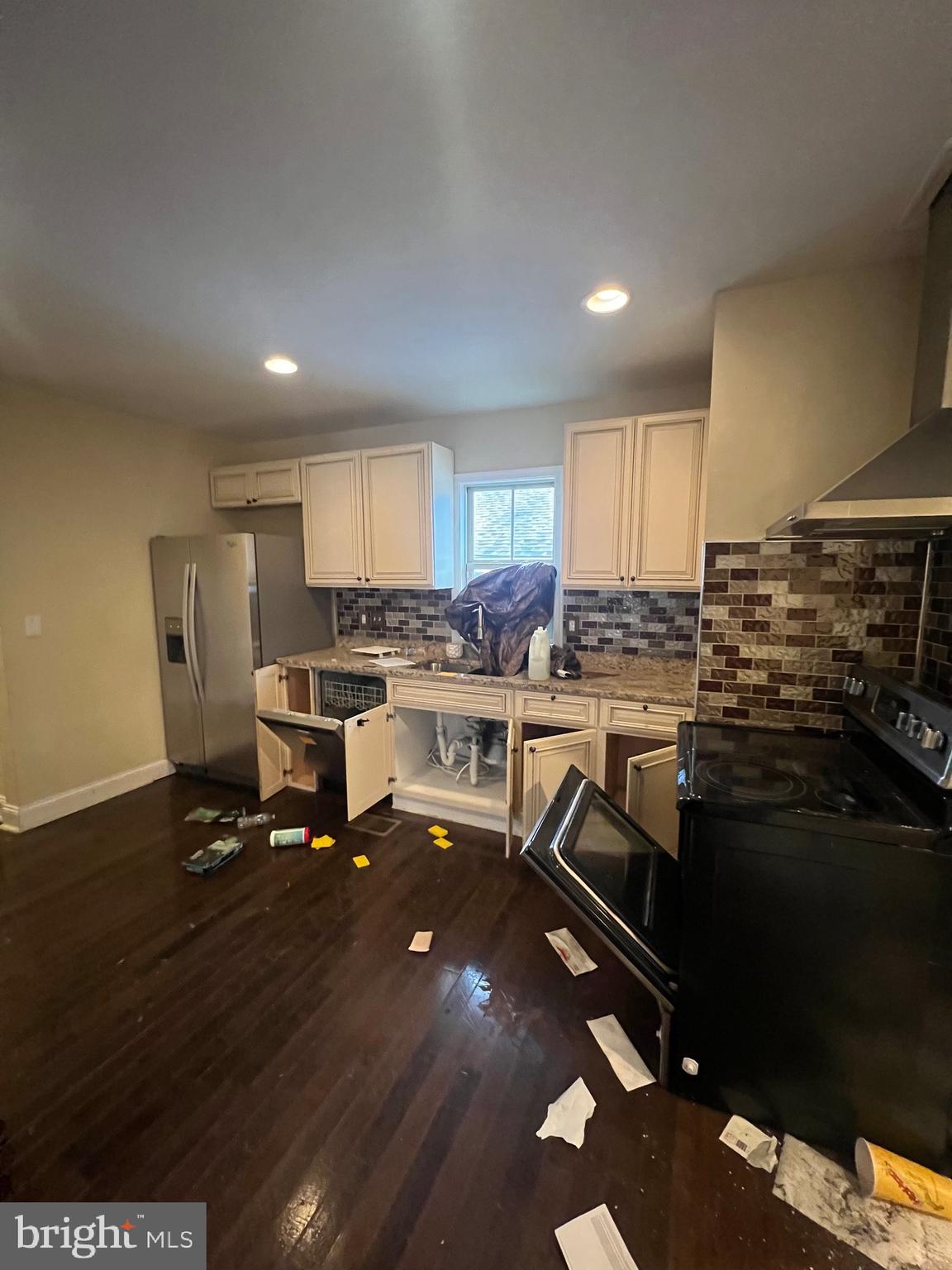 4243 Dix Street Northeast Washington, DC 20019 - Photo 11 of 43 a kitchen with a sink appliances and cabinets