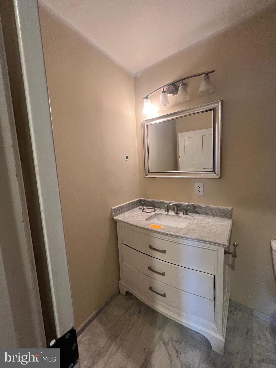 4243 Dix Street Northeast Washington, DC 20019 - Photo 17 of 43 a view of washer and dryer