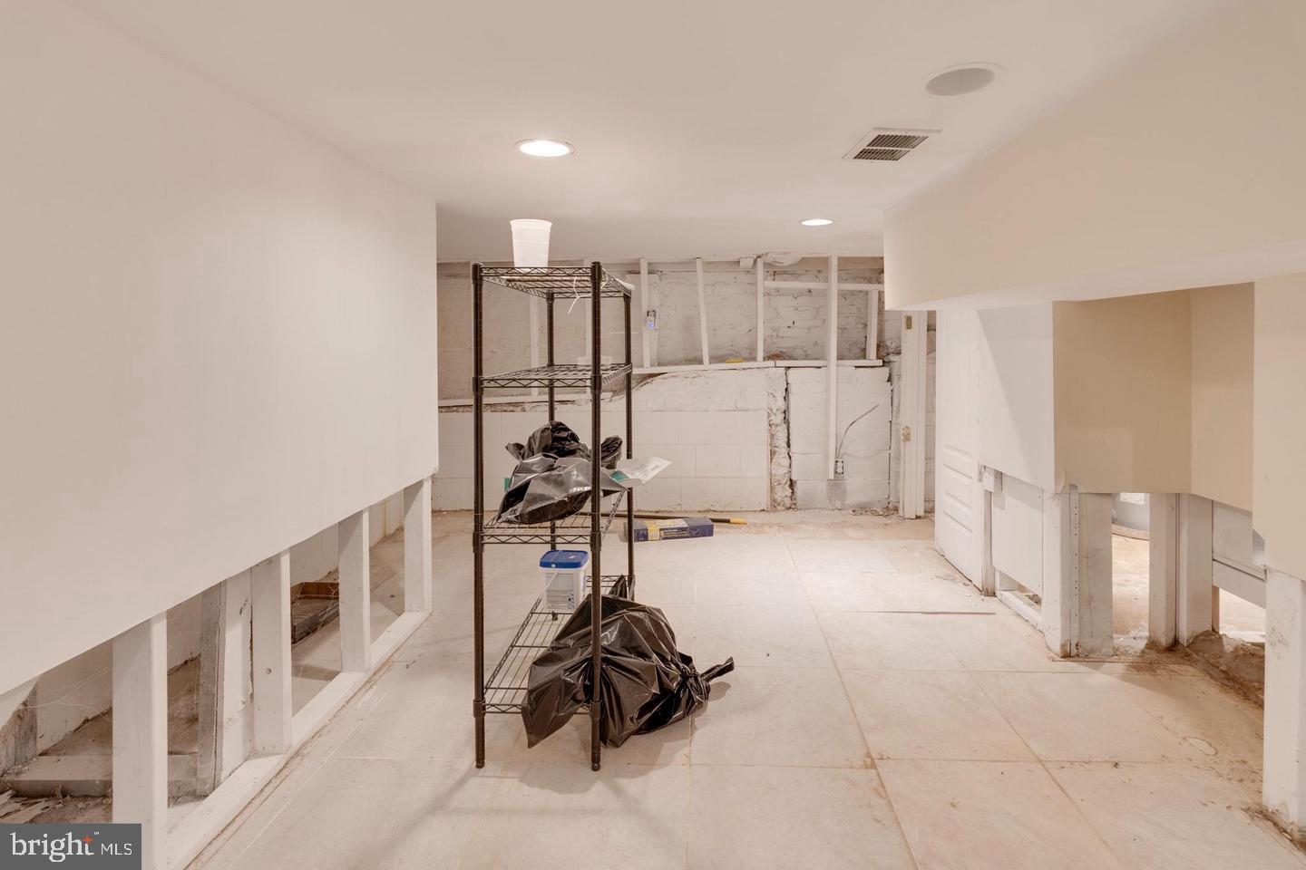 4243 Dix Street Northeast Washington, DC 20019 - Photo 37 of 43 a view of a room with gym equipment