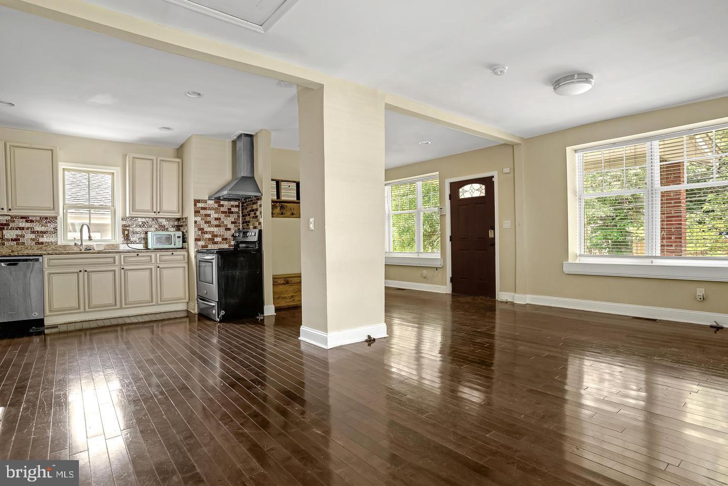 4243 Dix Street Northeast Washington, DC 20019 - Photo 41 of 43 a view of a kitchen with wooden floor and a window