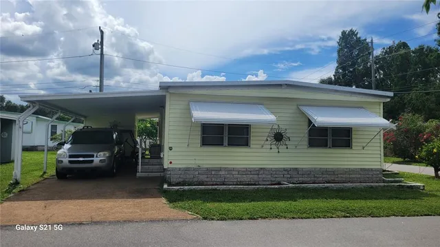 a view of a house with a garden