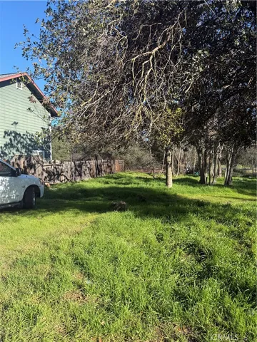 a view of a golf course with chairs