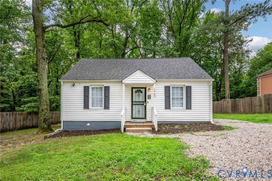 2909 Springview Drive Richmond, VA 23234 - Photo 1 of 19 a front view of a house with a yard