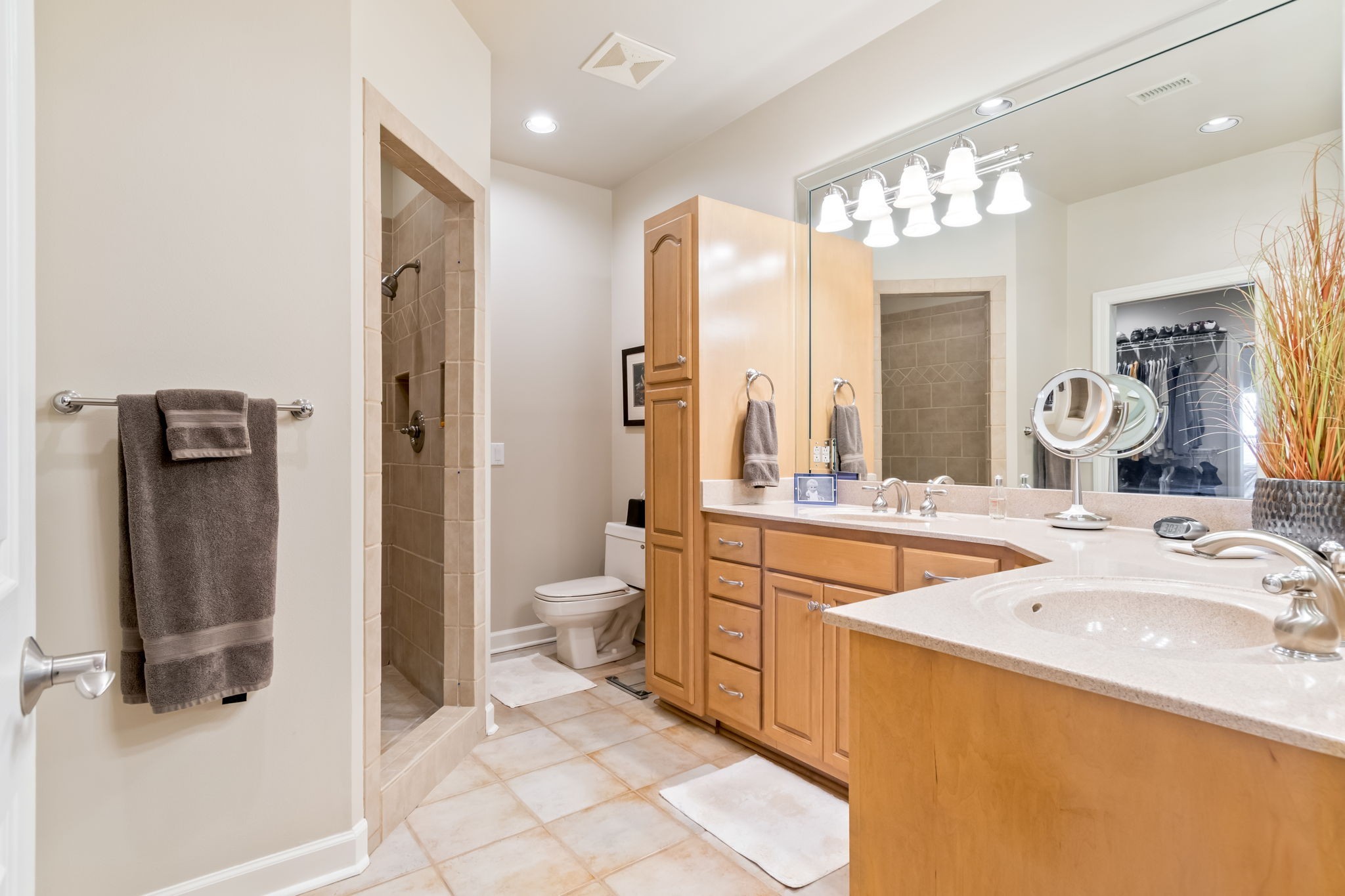 3100 Floyd Road Eagleville, TN 37060 - Photo 46 of 62 a spacious bathroom with a granite countertop sink mirror and a bathtub