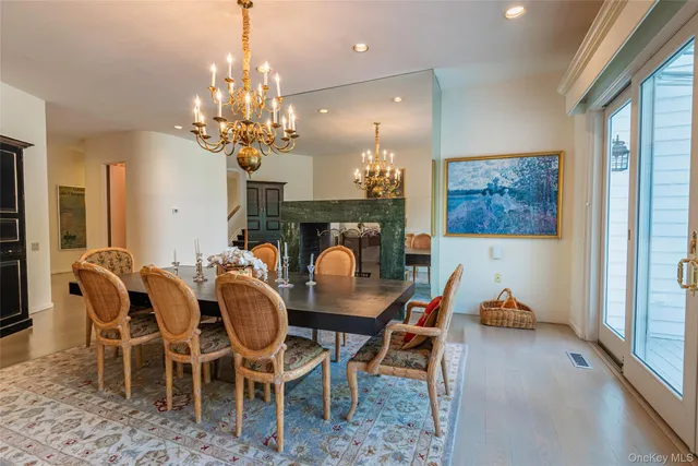 an aerial view of a house with yard swimming pool and outdoor seating
