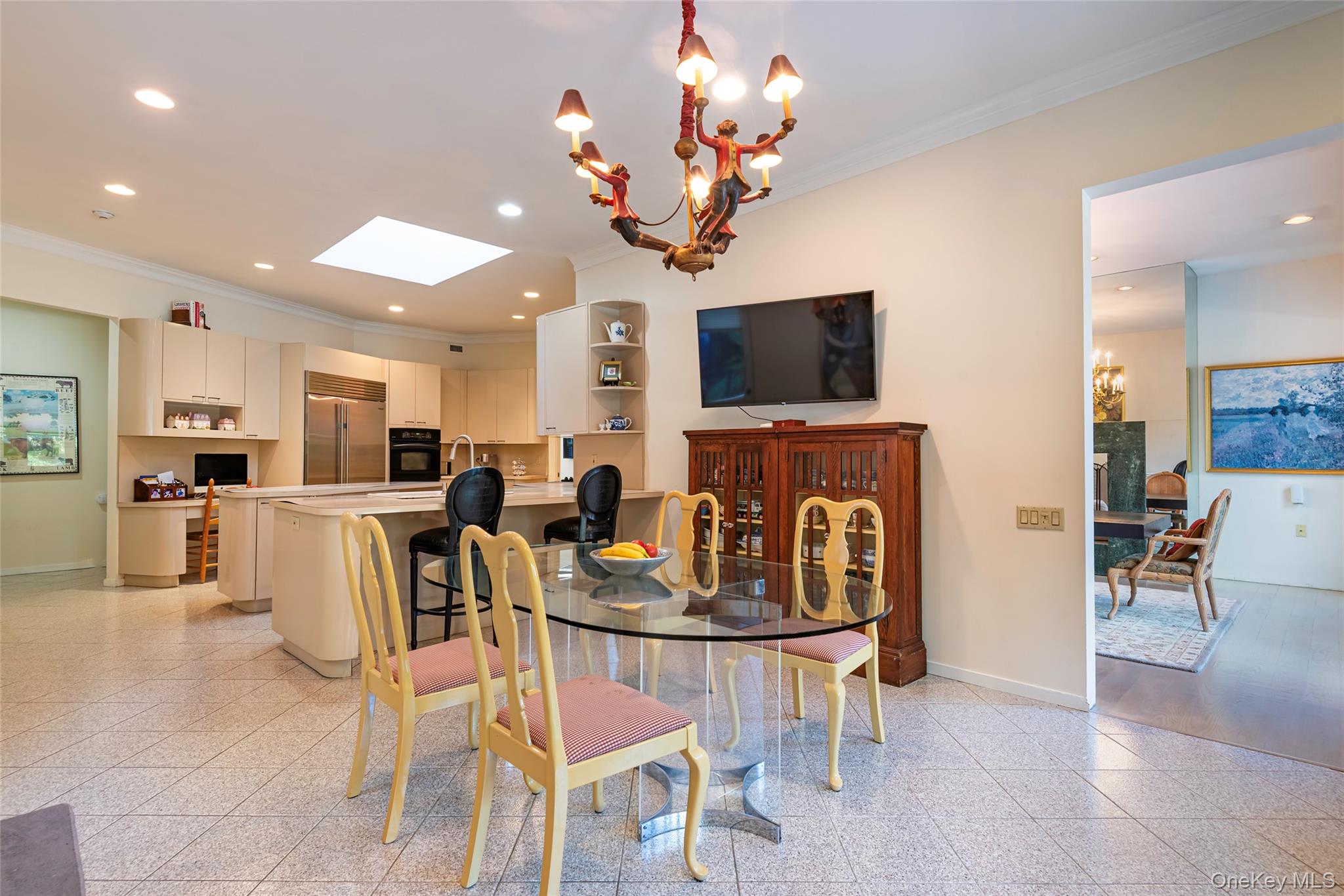 735 Remsens Lane Upper Brookville, NY 11771 - Photo 18 of 44 Dining space featuring ornamental molding, a chandelier, recessed lighting, and a skylight