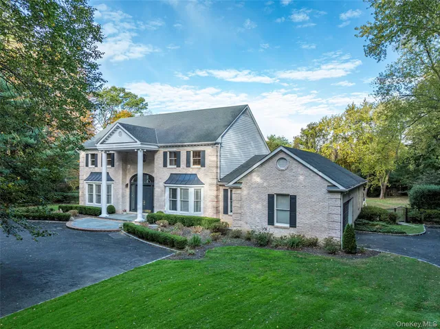 a view of a balcony with wooden floor and fence