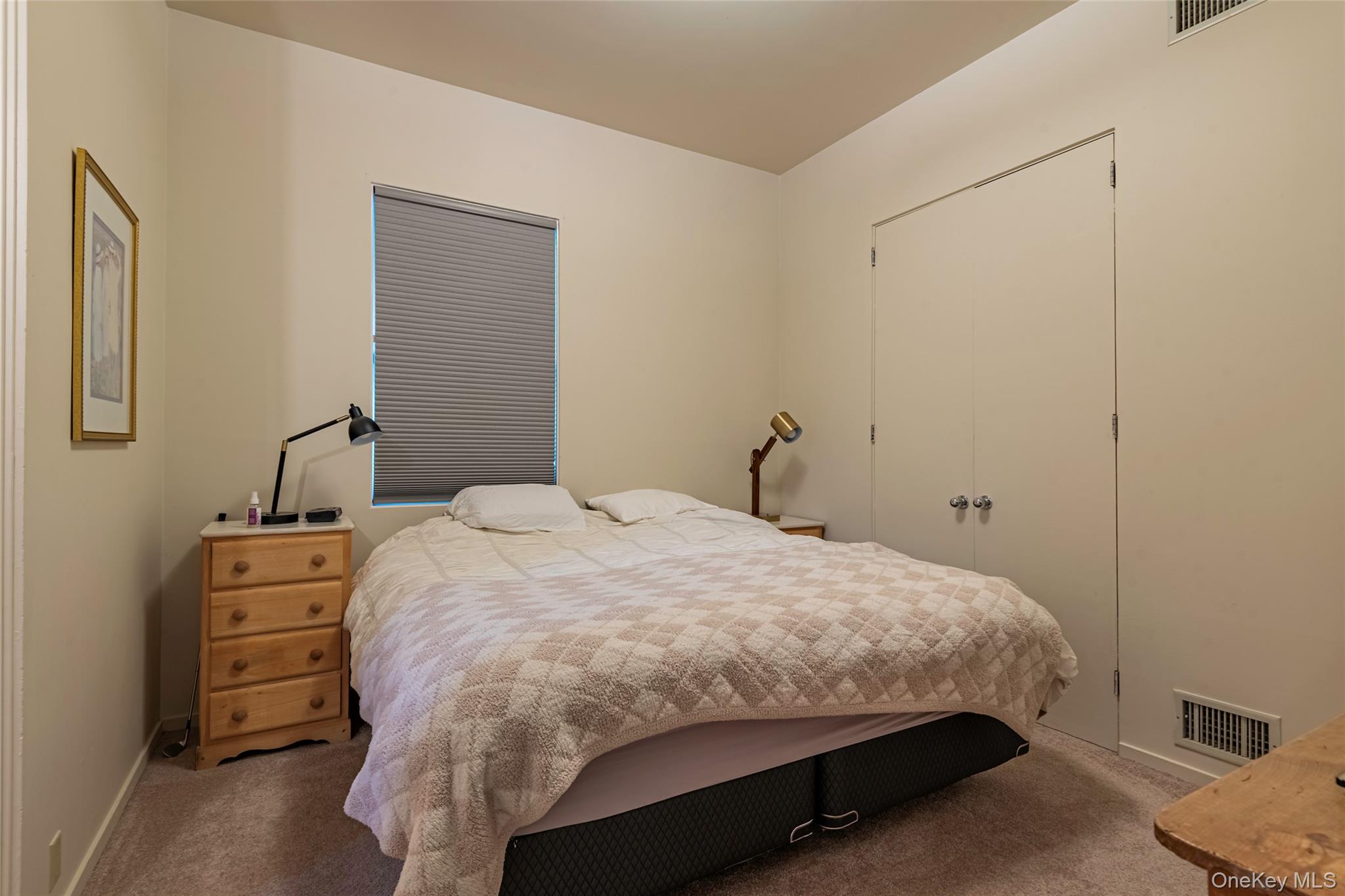 735 Remsens Lane Upper Brookville, NY 11771 - Photo 31 of 44 Carpeted bedroom with a closet and baseboards