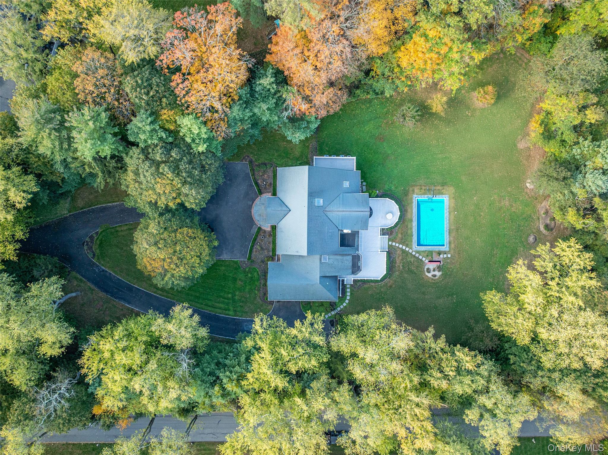 735 Remsens Lane Upper Brookville, NY 11771 - Photo 43 of 44 View of subject property with a pool